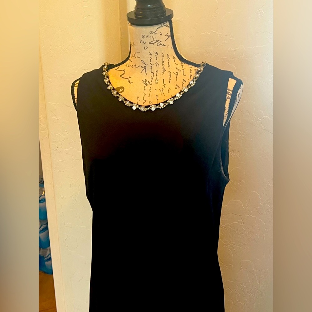 Little black chiffon dress. With Rhinestone neck Knee length.